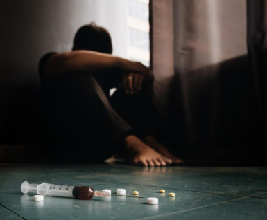a person addicted to drugs