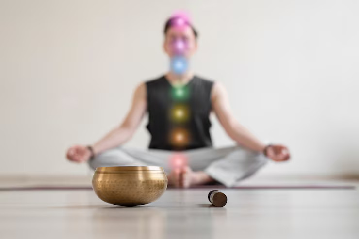 spiritual-young-man-practicing-yoga-indoors_23-2149163293